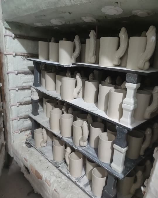 Ceramic sculptural objects arranged in the kiln