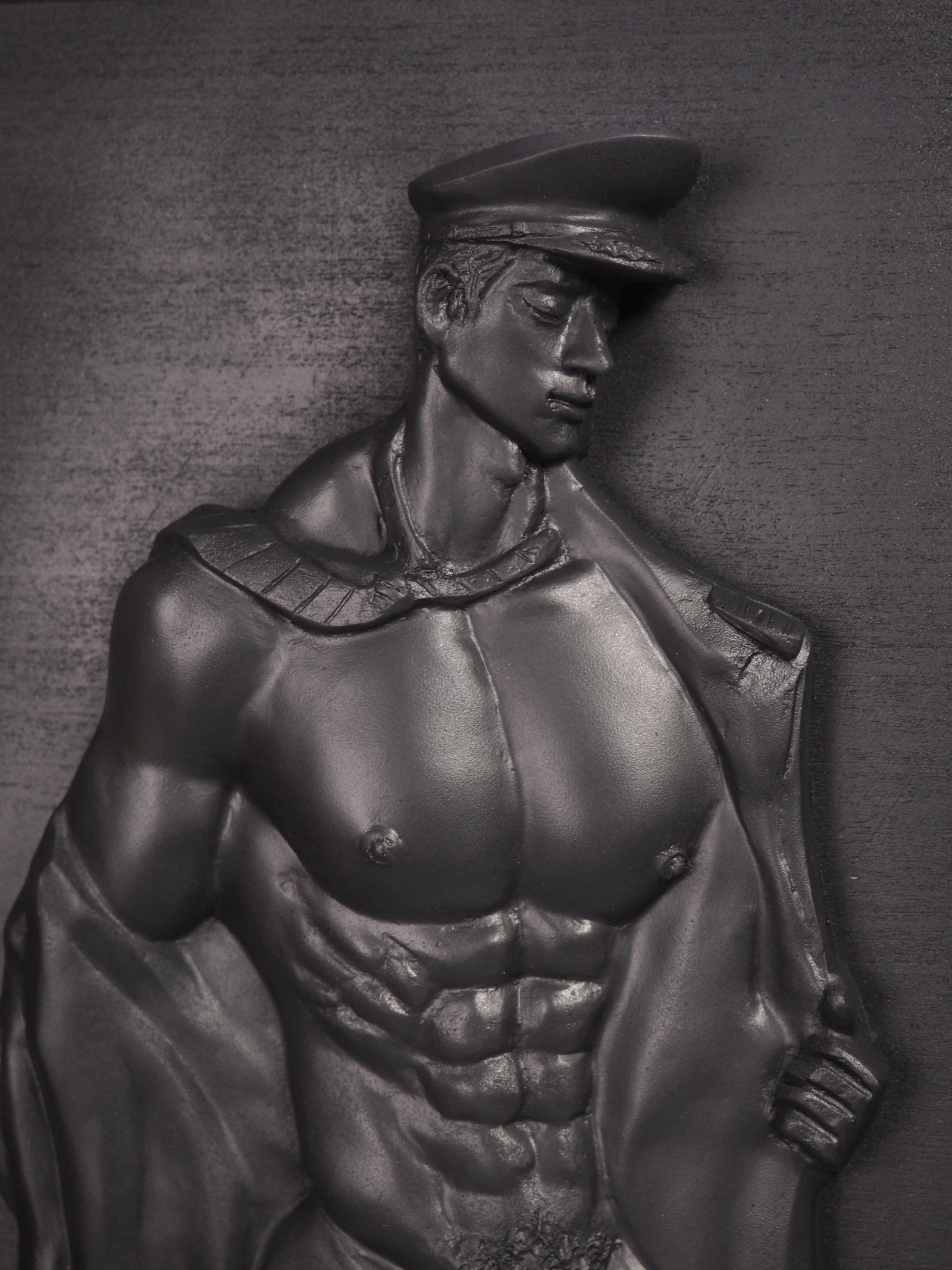 Detail view of Beneath the Rank Pure Black resin sculpture