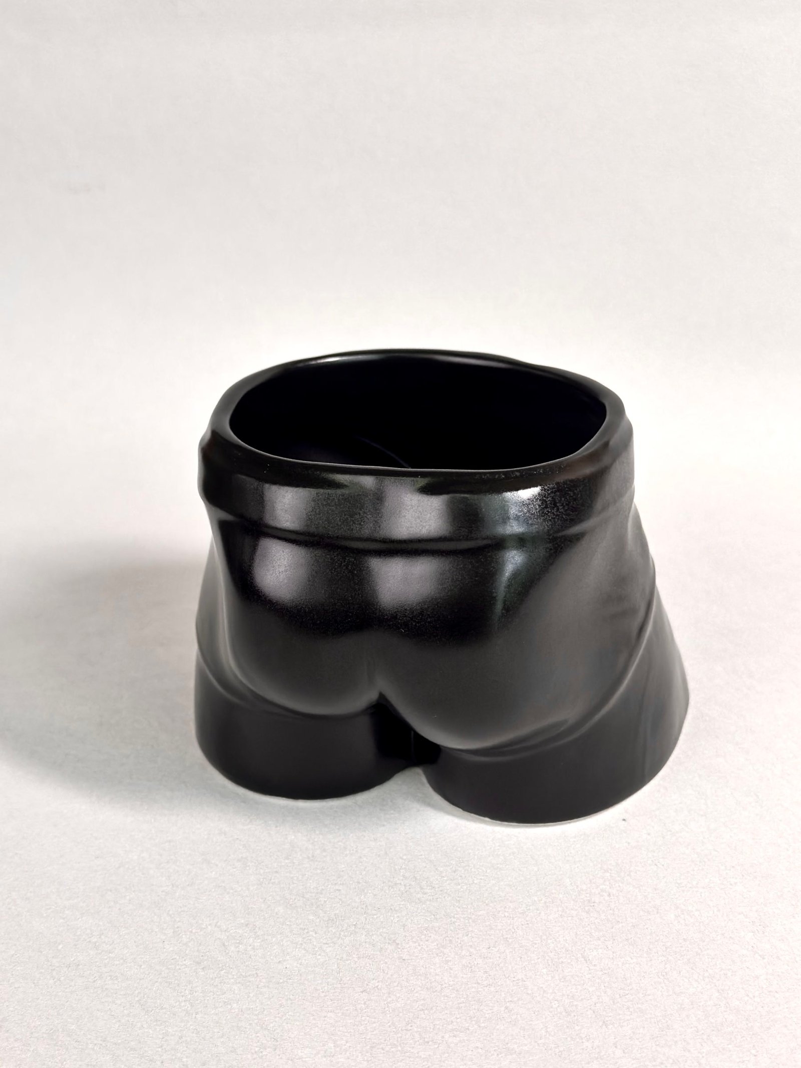 Detail view of Cup of Origo Black resin sculpture