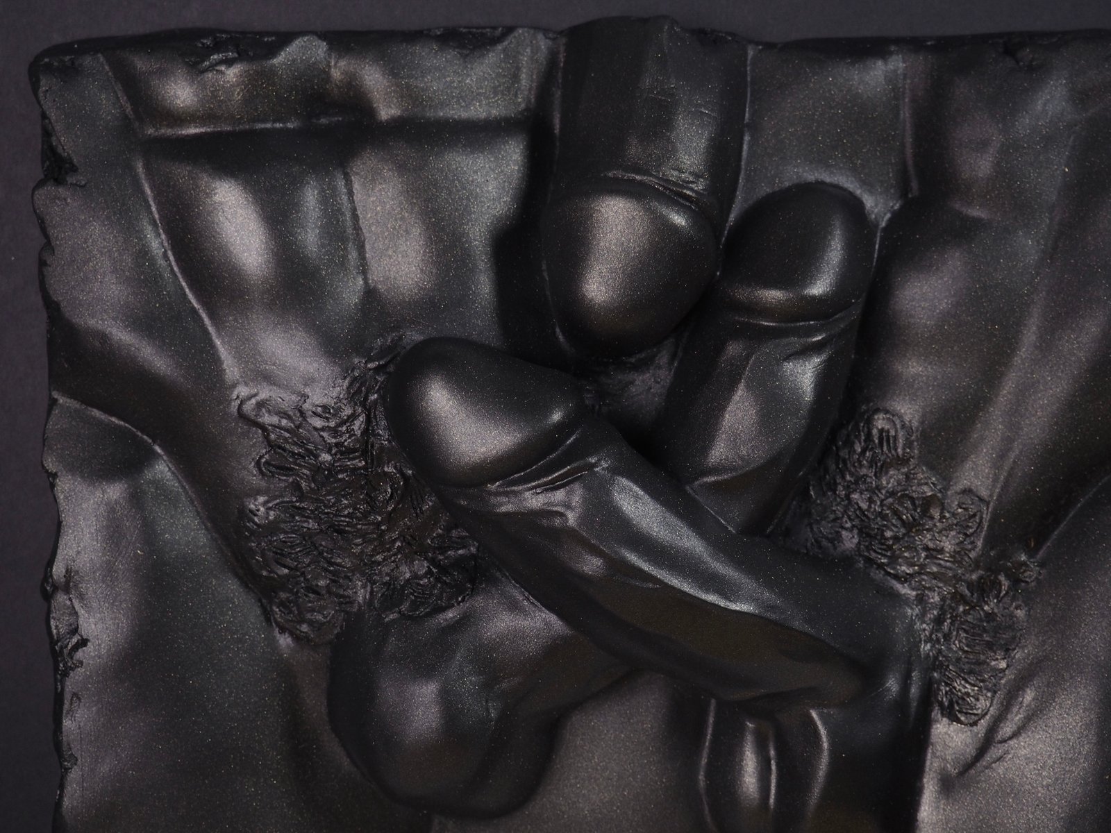 Detail view of Entwined Black Gold resin sculpture