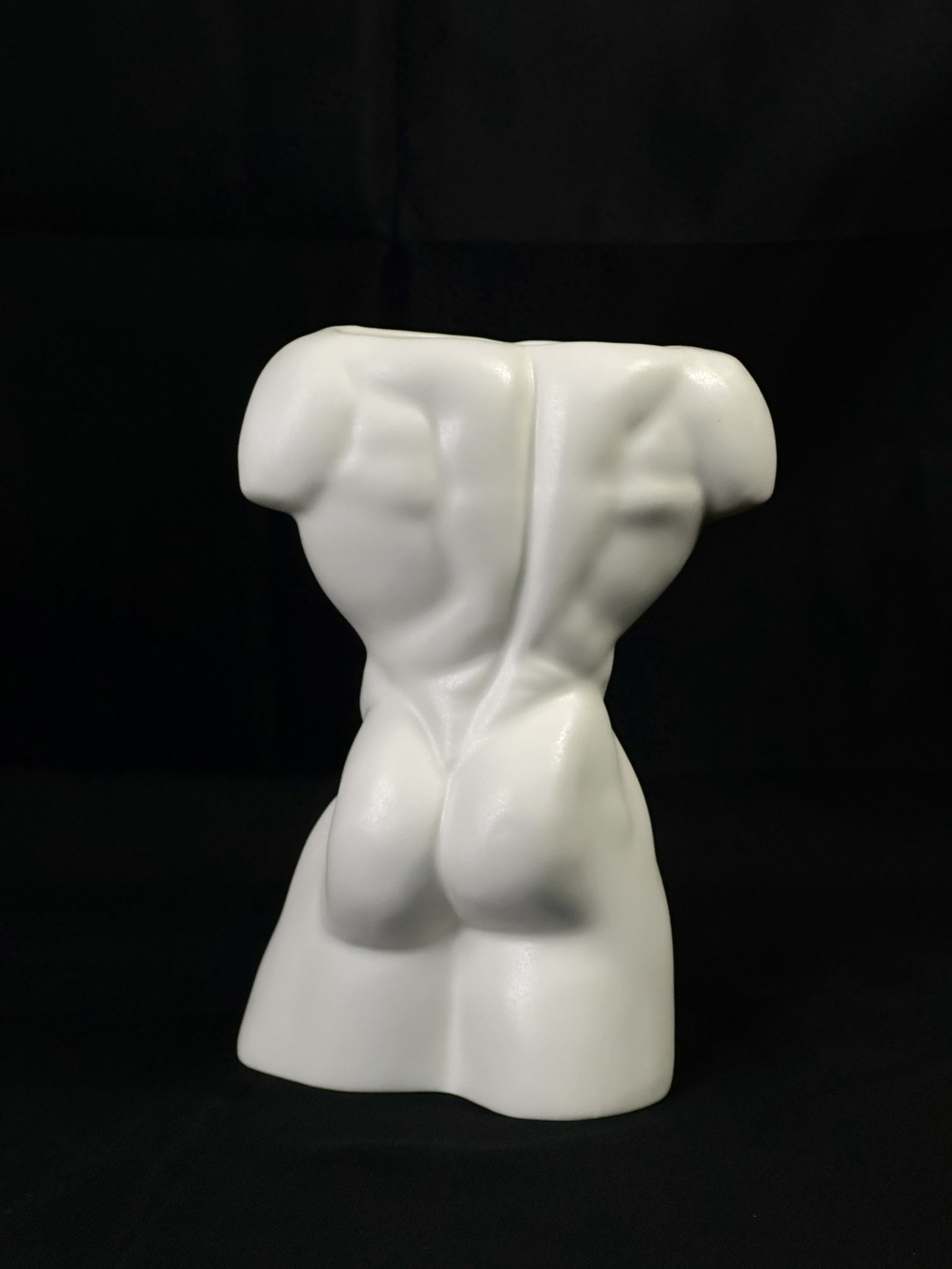 Detail view of Held by the Body ceramic sculpture