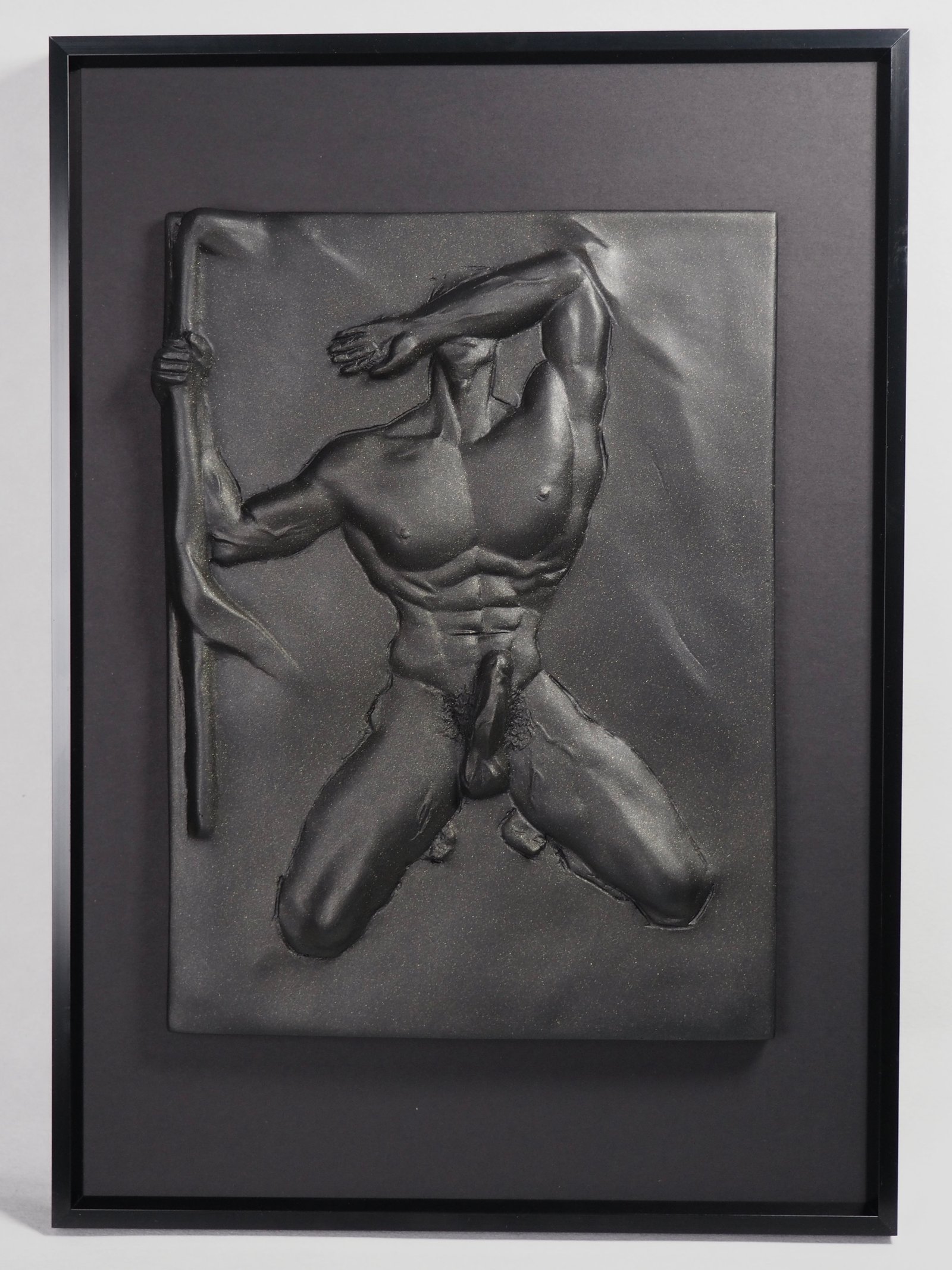 Detail view of Overcome Black Gold resin sculpture