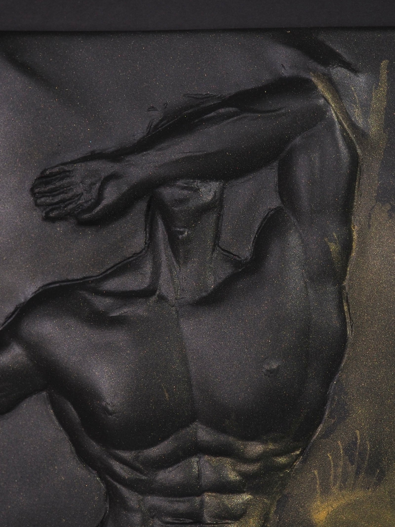Detail view of Overcome Gold Splash resin sculpture