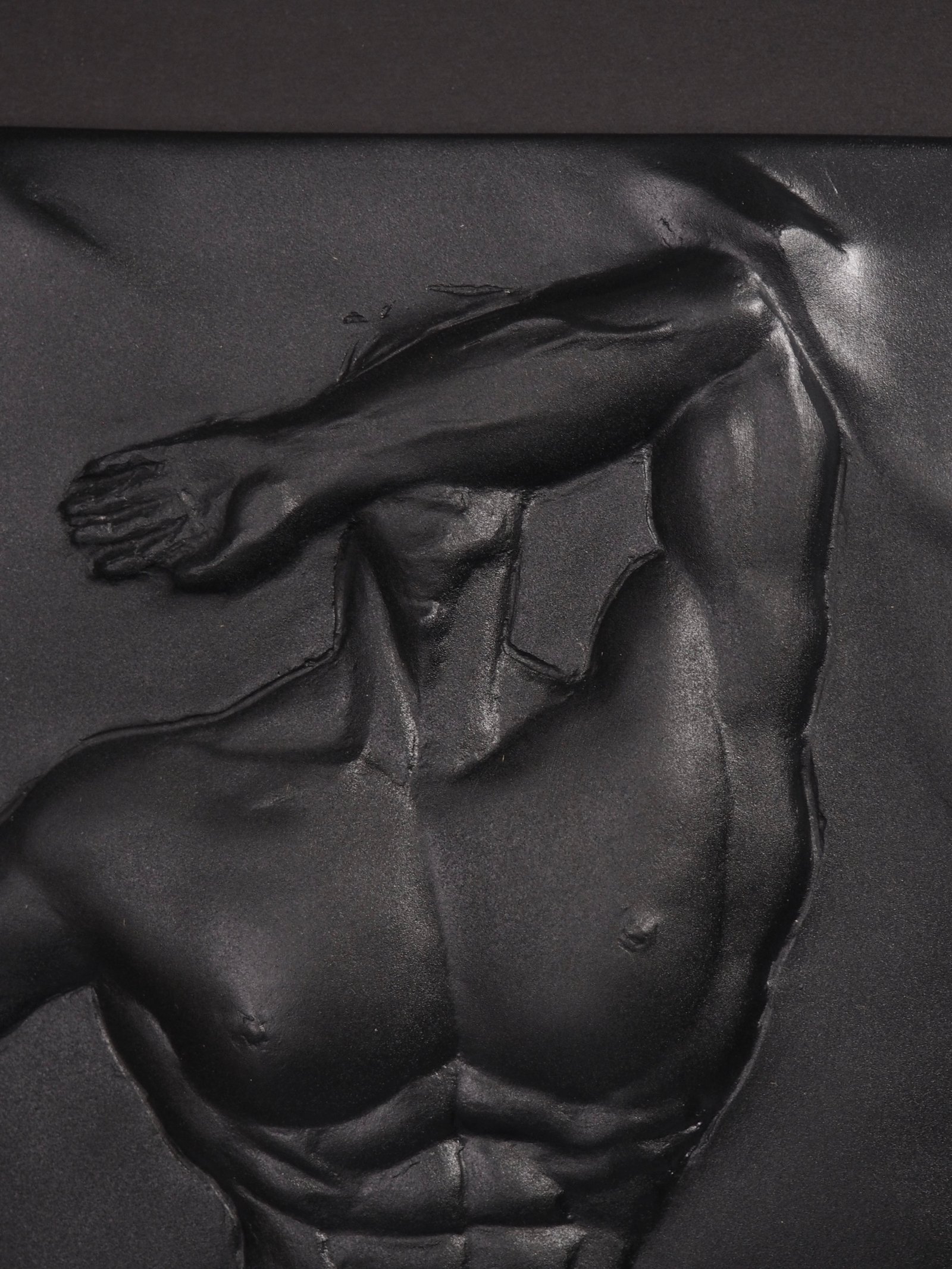 Detail view of Overcome Pure Black resin sculpture