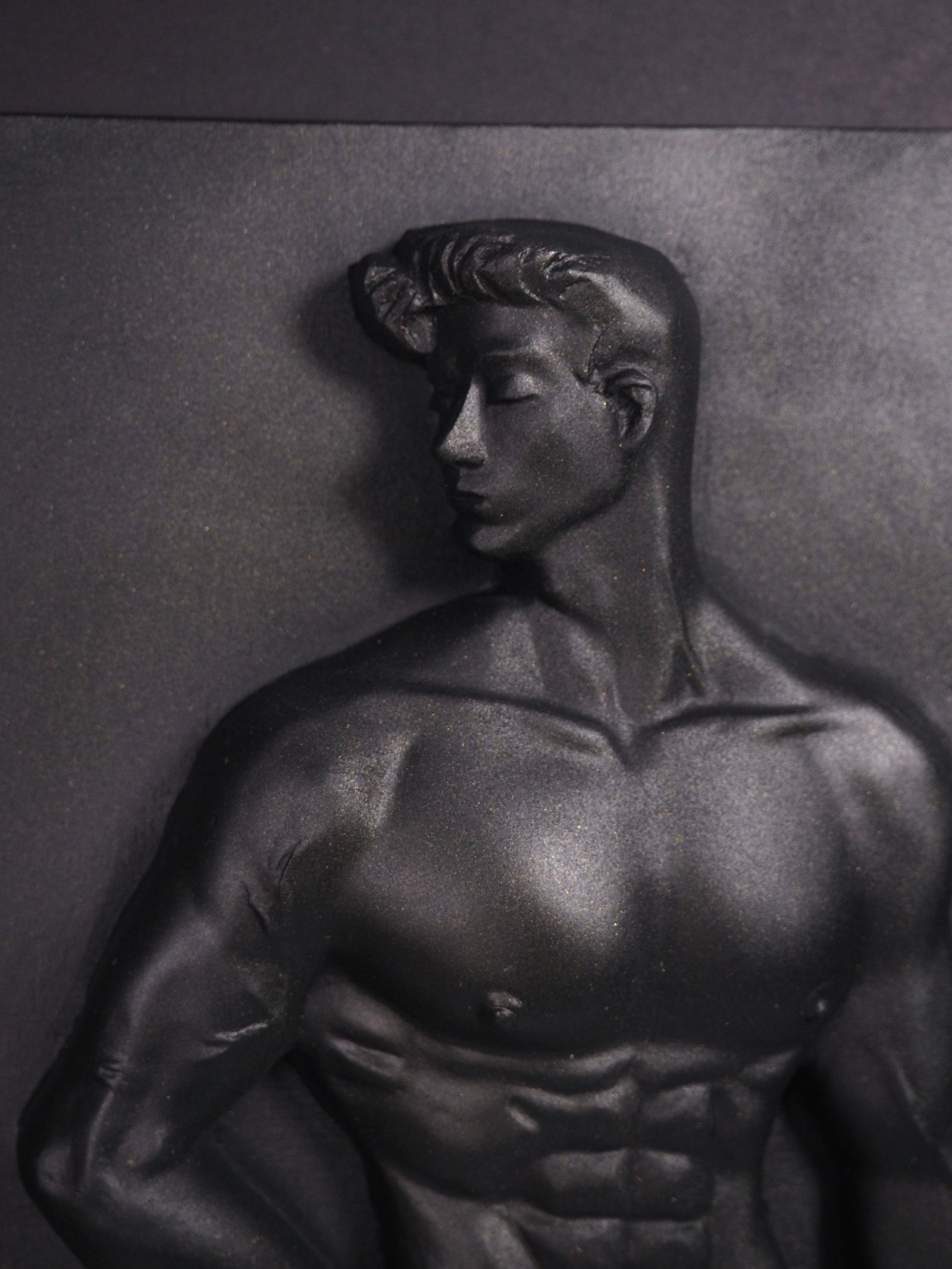 Detail view of Quiet Dominion Black Gold resin sculpture