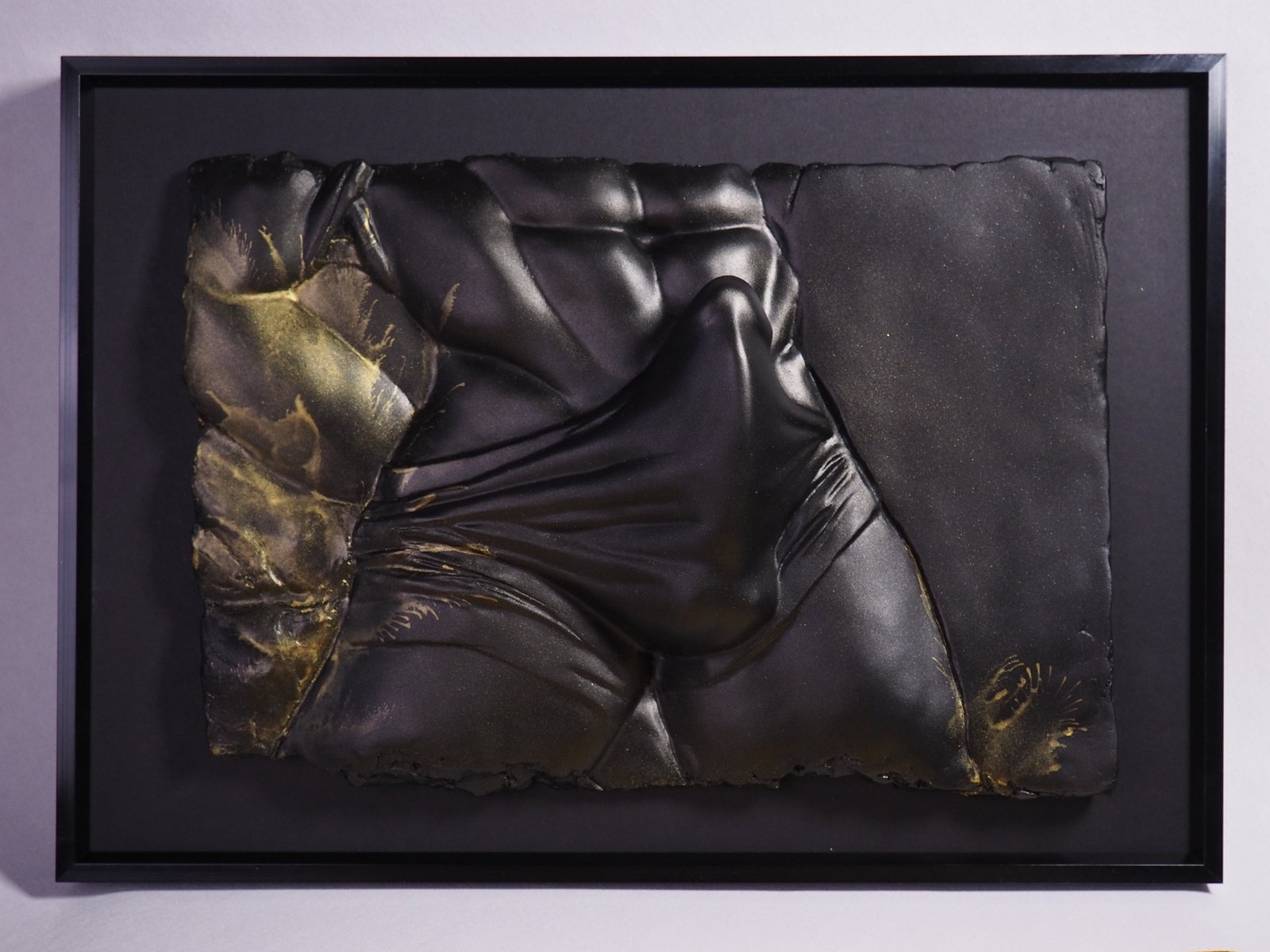 Detail view of The Shape of Want Gold Splash resin sculpture