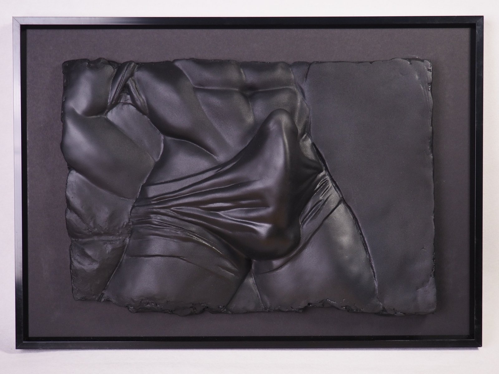 Detail view of The Shape of Want Pure Black resin sculpture