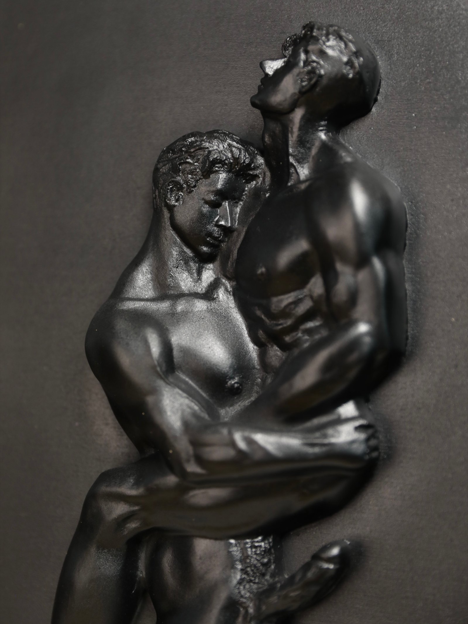 Detail view of Where We Yield Pure Black resin sculpture